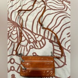 Gently used Hobo clutch/cross body with multi length strap